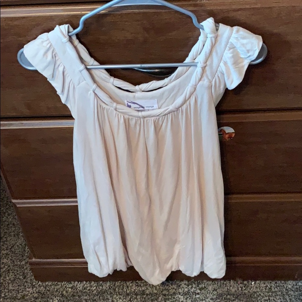 Cute off-white blouse with unique neckline!